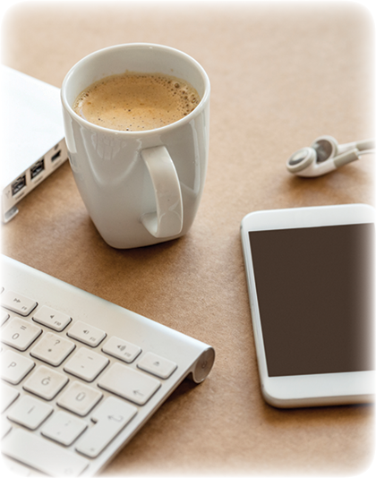 image of coffee, keyboard and cell phone